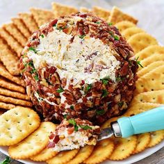 a plate with crackers and cheese on it