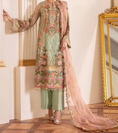 Brand New designer suit apple green with pink and yellow embroidery. Embroidered Net Shirt with silk lining. Plain Silk trousers. Embroidered Full size net duppatta. Dupatta 431/2 inch by 96 inches Shirt chest 21 inches, length 46 inches Trousers length 38 inches Green Anarkali Lawn Suit With Intricate Embroidery, Green Georgette Unstitched Suit For Designer Wear, Green Lawn Suit With Intricate Embroidery For Festive, Green Resham Embroidery Jamawar Set, Green Long Sleeve Lawn Suit With Zari Work, Designer Green Lawn Suit With Zari Work, Green Resham Embroidery Sets In Jamawar, Green Lawn Suit With Intricate Embroidery For Diwali, Green Organza Salwar Kameez For Eid