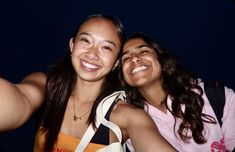 two young women taking a selfie together