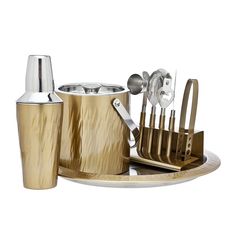 an assortment of kitchen utensils on a tray