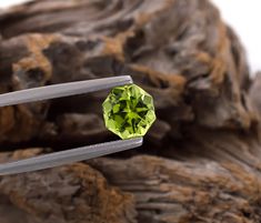 Here is beautiful, precision cut octagon (round) shape peridot from Supat Valley, Kohistan District, Pakistan. The gem shows a high degree of light return (brilliance). The green hue is beautiful and really glows. It is a perfect size gem for a ring or pendant. -Enjoy! ◊ Peridot Gemstone ◊ Carat Weight: 1.81ct ◊ Cut: Octagon (Round) Shape ◊ Color: Green ◊ Clarity: Eye-Clean ◊ Measurement: 7.33x7.19x6.01mm ◊ Treatment: None ◊ Locality: Supat Valley, Kohistan District, Pakistan ◊ Birthstone: August ◊ Stock No. 21154 ◊ Looking for more Peridot choices: https://etsy.me/38t7S5z ◊◊ Photo Lighting: 5600k LED Daylight Bulbs ◊◊ See below for clarity grade description ◊◊ Due to the camera's macro lens abrasions and internal inclusions are more noticeable in the photographs than in person. This is be Daylight Bulbs, Loose Emeralds, Imperial Topaz, Gem Show, Tsavorite Garnet, August Birthstone, Peridot Gemstone, Macro Lens, Green Peridot