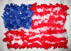 an american flag made out of red, white and blue tissue paper