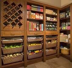 the pantry is stocked with many different types of food