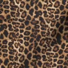 an animal print fabric is shown in brown and black