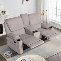 the reclining sofa has two seats on it