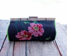 A delightful retro clutch made entirely of a vintage cross-stitch embroidery. It has a fresh green pompom trim on the sides and vintage flocked gingham as lining.  The strap is a beautiful chain witch can be removed to use it in your hand or as a big wallet or make-up pouch. It has 12 card compartments for credit cards, business cards, etc and closes securely. I love this kind of purse for a day out, concert, shopping, etc where you will need money but not much weight to enjoy your day or night to the fullest. Measurements: Width: 9'' (23 cm) Height: 4 1/2'' (11.5 cm) Depth: 2 1/2'' (6.5 cm) Strap: 41'' (104 cm), length can be changed, just leave a note during checkout with the length you want. Spot clean only, leather can easily be cleaned with a damp cloth or body lotion. Two shipping op Clutch Embroidery, Vintage Cross Stitch, Vintage Cross Stitches, Fresh Green, Diy Bag, The East, Clutch Handbag, Cross Stitch Embroidery, Crochet Bag