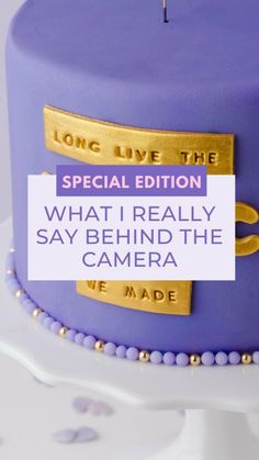 a purple cake with gold lettering on it and the words, long live the special edition what i really say behind the cake