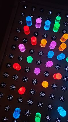 a close up of many different colored lights