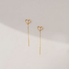 14k Real Gold Dangling Open Heart Earrings is no better way to express your love. Find the long line that connects your heart to hers. Choose a special day to celebrate your love, whether it's a birthday, an anniversary, or simply a regular Friday. D E T A I L S   * Made to Order. * 100% 14k Solid Gold * Choice of Gold Color: Yellow Gold, Rose Gold, White Gold * Chain length: 50 mm / 1.96 inch * Chain thickness: 1 mm / 0.03 inch * Charm width: 10 mm / 0.39 inch * Charm length: 8 mm / 0.31 inch * 14k White Gold Linear Earrings, 14k Yellow Gold Threader Earrings, Elegant Yellow Gold Heart Earrings Gold-plated, Elegant Dangle Jewelry With Heart Charm, Elegant Gold Plated Heart Pendant Earrings, Elegant Gold Plated Earrings For Valentine's Day, Sterling Silver Dangle Heart Earrings, Tarnish Resistant, 14k Gold Linear Earrings For Anniversary, Yellow Gold Open Heart Earrings For Wedding