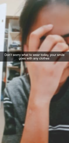 a man holding his hand to his face with the caption don't worry what to wear today, your smile gives you everything