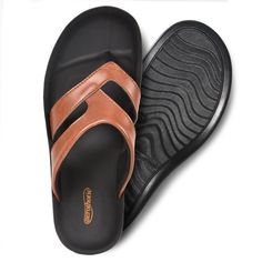 Experience signature comfort in a style you'll love to wear with our soft padded strap sandals. Designed for a comfortable and supportive ride, Raido sandals feature a contoured sole and accentuated arch support, ensuring relaxed movement for your feet. The roomy toe area and deep heel cup effectively cradle your feet, while the polyurethane injected sole provides extra softness and cushioning with each step. Perfect for all your summer adventures, our women's walking sandals are crafted to trea Comfortable Toe Post Sandals With Ortholite Insole, Comfortable Open Toe Sandals With Gel Cushioning, Comfortable Flip Flops With Removable Insole, Comfortable Brown Sandals With Arch Support, Brown Open Toe Flip Flops With Arch Support, Comfortable Toe Post Sandals With Removable Insole, Comfortable Flip Flops With Cushioned Footbed, Comfortable Flip Flops With Arch Support And Round Toe, Comfortable Slip-resistant Synthetic Sandals