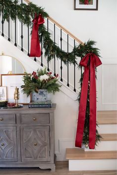 christmas decorations on the banister and stairs