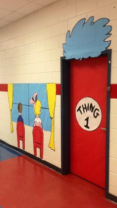 this is a hallway in a school with the door painted to look like dr seuss