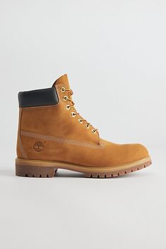 Original and iconic wheat leather work boots from Timberland. Premium full-grain and nubuck leather uppers with seam-sealed waterproof construction. Ultra-cushioned footbed and a padded ankle collar for extra comfort along with two-tone cord laces and metal eyelets. Rubber lug outsole for ultimate traction and durability finished with branded logo detailing at the side. Features Timberland Classic 6" work boot Essential leather work boots Premium leather upper Lace closure front Lugged outsole C Timberland Brown Work Boots For Streetwear, Brown Timberland Work Boots For Streetwear, Timberland Brown Streetwear Work Boots, Classic Timberland Hiking Boots With Reinforced Toe, Classic Timberland Hiking Boots With Reinforced Heel, Classic Timberland Hiking Boots For Outdoor Work, Rugged High-top Timberland Work Boots, Rugged Timberland Ankle Work Boots, Classic Timberland Hiking Boots With Moc Toe