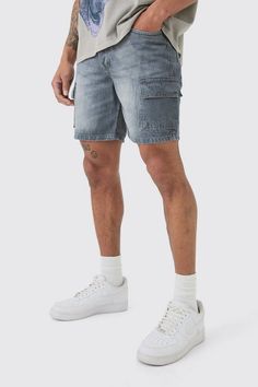 Denim shorts are the perfect way to introduce effortless cool into your casual arsenal. When the summer kicks into full gear, ditch your full-length denim in favour of a cool pair of denim shorts. Available in a variety of colours, washes and finishes, these shorts combines the comfort of shorts with the versatility of jeans and are definitely a men's holiday fashion essential. Pairing denim shorts with a short sleeve printed shir is a guaranteed way to inject style into your beach attire, or you can always opt for a slim fit t-shirt for an outfit more on the relaxed side. Finish off with loafers.Style: Fashion Denim ShortsDesign: PlainFabric: DenimLength: Mid Denim Cargo Shorts With Cargo Pockets, Denim Blue Cargo Jean Shorts, Urban Style Denim Blue Short Bottoms, Urban Denim Blue Short-length Bottoms, Urban Denim Blue Short Bottoms, Denim Cargo Shorts For Streetwear, Urban Denim Blue Shorts, Denim Blue Cargo Pocket Jean Shorts, Medium Wash Cotton Jean Shorts With Cargo Pockets