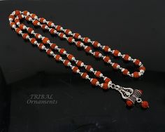 "Silver handmade caps with natural rudraksha beads necklace and pendant, rudraksha mala . fabulous unisex silver jewelry. maks excellent gifting . Weight-24.200 grams length-26\" inches. Beads size-6 mm. Pendant height-4 centimeters. Pendant width-2 centimeters. metal-925 silver brand-handmade. Stamped-925 on pendant material-natural rudraksha beads." Chain With Pendant, Rudraksha Mala, Rudraksha Beads, Beads Chain, Silver Chain Style, Beaded Chain, Chain Styles, Handmade Silver, Chains Necklace