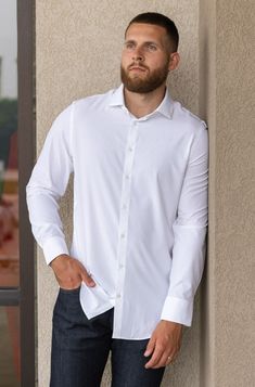 Product Description Long sleeve, button-down, white trim fit shirt. This best selling Leeward style features performance fabric that will make this a go to in your wardrobe. Details & Fit Recommend ordering true to size Front Body Length: 29.5" (Measured from Large) Performance fabric dress shirt Superior quick-dry properties Wrinkle resistant Spread collar Back darts Long sleeves Convertible cuffs Curved hem Materials & Care 85% Polyester 15% Spandex Machine Wash Cold Shirt Wrinkles, Trim Fit, Long Sleeve Shirt Dress, White Trim, Performance Fabric, Shirt White, Dress Fabric, Dress Shirt, Phone Numbers