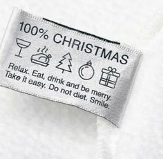 a label that says, 100 % christmas relax eat drink and be merry take it easy do not diet smile