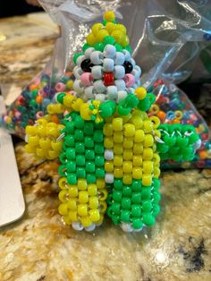 a toy made out of beads sitting on top of a counter