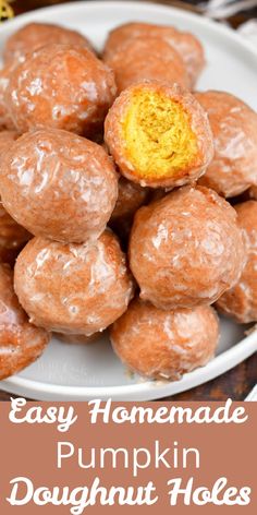 homemade pumpkin doughnut holes on a white plate with text overlay that reads easy homemade pumpkin doughnut holes