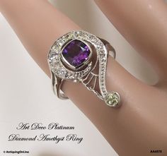 "Platinum Diamond Amethyst Art Deco Ring, Vintage 1920s Art Deco Engagement Ring, Music Jewelry, G Clef Jewelry, February Birthstone This is one spectacular ring from the gorgeous color of the focal amethyst to the unique design. Depending on how you look at the ring, or wear it for that matter, you get an entirely different feel for what the design represents. The first image in the series depicts a question mark. The second, third, fourth and the last image, in my mind's eye, depict the music Treble Clef Ring, Art Deco Jewelry Rings, Amethyst Art, Engagement Ring Art Deco, Music Jewelry, Purple Jewelry, 1920s Art, Art Deco Engagement, Treble Clef