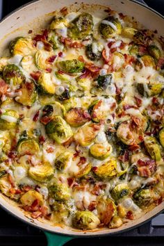 a skillet filled with cooked brussel sprouts and other toppings