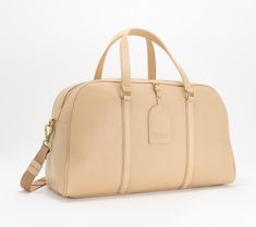 When you need to getaway for a couple of days, this sleek and chic leather weekender makes the perfect travel companion. From American Leather Co. Elegant Weekender Bag For Weekend Trips, Elegant Duffle Bag For Weekend Trips, Elegant Weekender Bag With Leather Lining For Weekend Trips, Elegant Weekender Bag With Leather Lining, Elegant Weekender Bag With Leather Lining For Travel, Elegant Leather Travel Bag For Weekend Trips, Elegant Textured Leather Weekender Bag For Travel, Elegant Leather Trim Travel Bag For Weekend Trips, Elegant Travel Bag With Leather Trim For Weekend Trips