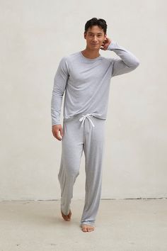 Aaron is 6'0" Sporty Sleepwear With Elastic Waistband And Relaxed Fit, Sporty Sleepwear With Elastic Waistband, Sporty Sleepwear With Elastic Waistband For Relaxation, Casual Sleepwear With Relaxed Fit Long Pants, Relaxed Long Sweatpants For Loungewear, Casual Sleepwear Pants For Lounging, Casual Long Pants Sleepwear For Lounging, Comfy Relaxed Fit Sleepwear For Lounging, Comfy Sleepwear With Relaxed Fit For Lounging