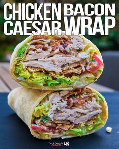 the chicken bacon caesar wrap is cut in half and stacked on top of each other