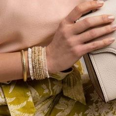 Think swaying Palmetto trees in the ocean breeze. Blushing camellias and billowy canopies. It’s only natural that the resort-style vibe of our Oldfield Collection pay homage to the landscape of our Lowcountry beauty with fluttering tassels, shimmering faceted beads and natural stones. From toggle bracelets dripping in charms to golden cuffs sculpted with stars, our bracelets and bangles are made to arm you with brilliant beauty. DETAILS 18 KT Matte Gold Plated Magnetic and Safety Latch Closure Length: 7 in. Soft and flexible wrap style Glass Crystals Glass & Metal Beads Strings Bohemian Bracelets For Summer Weddings, Bohemian Summer Wedding Bracelets, Summer Wedding Bohemian Bracelets, Elegant Summer Wedding Bracelets, Elegant Beach Bracelets For Spring, Elegant Beige Beach Bracelet, Elegant Spring Beach Bracelets, Elegant Spring Natural Jewelry, Elegant Woven Jewelry For Vacation