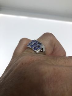 Unusual Deep purple blue Tanzanite Sterling Filigree Setting Handmade size 6 Can be resized, my jeweler uses a laser and charges a $10 -$20 fee. All rings are shipped in a nice gift box. Check out our over a THOUSAND great reviews Engraving is $4 per letter and is not always perfect depending on the piece. It can take a few days if the jeweler is busy. This is payable to Paypal Judithsltd@gmail.com Fine Jewelry Sapphire Ring Gift, Sapphire Jewelry Stamped 925 For Anniversary, Blue Tanzanite Jewelry Perfect As A Gift, Sapphire Ring Stamped 925 As A Gift, Sapphire Rings Stamped 925 As Gifts, Anniversary Blue Sapphire Ring Stamped 925, Blue Tanzanite Jewelry As A Gift, Formal Blue Sapphire Ring Stamped 925, Multi-stone 14k White Gold Jewelry Gift