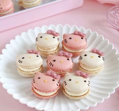 hello kitty macaroons are arranged on a plate