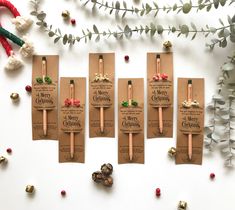 six small christmas stick decorations on top of brown paper