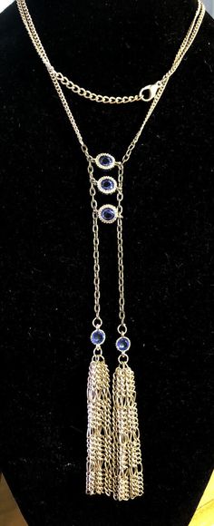 * Estate Silver Tone Round Blue Faceted Glass Bohemian Style Statement Necklace * Chain length: 28-1/2" including 2" extender * Chain width:1/8" * Pendant length: 7-1/4" * Pendant width: 2-1/8" * Three round glass beads measure approximately 7.75 mm each * Two round glass beads measure approximately 5.25 mm each * Necklace weight: 27.6 tgw * Unmarked * Clasp: Lobster * Condition: As pictured. * C872    Exported By ExportYourStore :) Blue Lariat Jewelry With Adjustable Chain, Blue Lariat Necklace With Adjustable Chain, Blue Long Lariat Necklace With Adjustable Chain, Elegant Blue Lariat Necklace With Adjustable Chain, Blue Lariat Jewelry For Party, Blue Lariat Necklace For Party, Necklace Chain Lengths, Faceted Glass, Style Statement