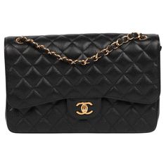 Chanel Black Quilted Caviar Leather Jumbo Classic Double Flap Bag Brand- Chanel Model- Jumbo Classic Double Flap Bag Product Type- Shoulder Serial Number- 19****** Age- Circa 2014 Accompanied By- Chanel Dust Bag, Box, Authenticity Card, Care Booklet Colour- Black Hardware- Gold Material(s)- Caviar Leather Height- 19cm Width- 30cm Depth- 10cm Strap Drop- Single: 58cm Double: 32.5cm Interior- Burgundy Leather Closure- Turn Lock Country of Origin- Italy Condition Rating- Excellent Exterior Conditio Number 19, Chanel Model, Black Quilt, Chanel Black, Black Hardware, Chain Shoulder Bag, Flap Bag, Gold Material, Fashion Handbags