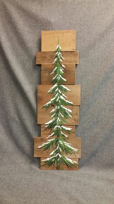 a christmas tree made out of wooden planks