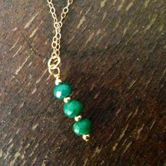 This necklace created by Jewelry by Carmal is made of green emerald faceted gemstones, gold filled: chain, spring ring clasp and findings. This necklace measures 18 inches in length the pendant measures an additional 1/2 inch. View other chain necklaces: http://www.etsy.com/shop/jewelrybycarmal?section_id=8001511 All of our jewelry arrives wrapped and ready for gift giving. We offer free standard shipping, via USPS, within the United States. Green Jewellery, Jewellery Gold, Green Jewelry, May Birthstone, Emerald Necklace, Handmade Wire Jewelry, Jewelry Gemstone, Green Emerald, Chain Pendant