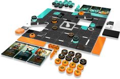 a board game with orange and black pieces