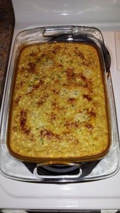 a casserole dish sitting on top of a stove