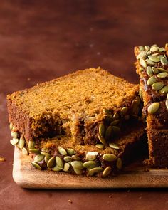 two slices of pumpkin bread on a cutting board