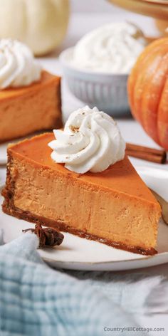 a slice of pumpkin pie with whipped cream on top