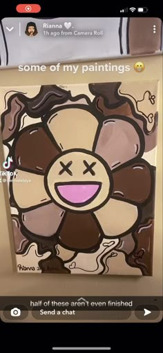 an image of a flower painted on the back of a cell phone screen that says, some of my paintings half of these aren't even finished send a chat