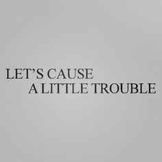 the words let's cause a little trouble are shown in black on a gray background