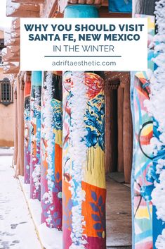 colorfully painted columns with the words why you should visit santa fe, new mexico in the winter