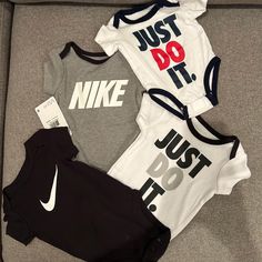 Set Of 4 Nike Onesies. Top Right (Red ‘Do’) Is Newborn And Euc, The Other Three Are Size 3-6m And Are Nwot/Nwt (Came In A Lot But Were Torn Apart - Tag Is Attached To Black One). Selling As Lot. $25 Shipped For All 4. Infant Onesies, Kids Nike, Nike Shirts, Kids Shirts, Onesies, Shirts Tops, Baby Onesies, Kids Shop, Black And Grey