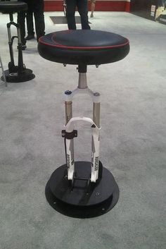 a chair that is sitting on some kind of stand