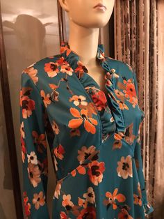 Really great 1970's floral boho dress.  Vintage tag size 16 Bust 20 Waist 16 Hip 22 Sleeve 22 Length 57 No returns or refunds.  Please note the items I sell are vintage and pre-owned, I look over every item closely and note any imperfections or wear, that said, there may be minor flaws that have been missed. Retro Floral Print Maxi Dress For Fall, Vintage Floral Print Maxi Dress For Party, Retro Vintage Dress With Floral Print For Fall, Bohemian Vintage Dress With Floral Print, Vintage Long Sleeve Floral Dress, Vintage Long Sleeve Floral Dress For Garden Party, Vintage Floral Print Maxi Dress For Garden Party, Vintage Floral Maxi Dress For Garden Party, Retro Floral Print Dress For Fall