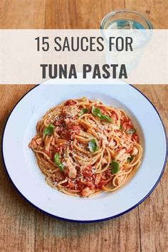 a white plate topped with pasta and sauce