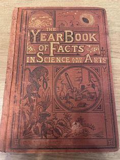 the year book of fact in science and arts, with illustrations on red leather cover