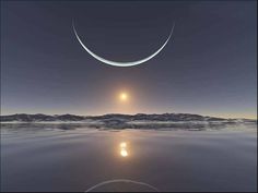 the moon is reflected in the water as it rises above the horizon and reflects on the surface